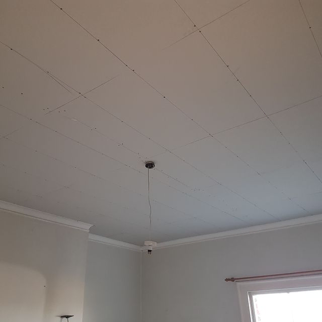 over boarding artex ceiling