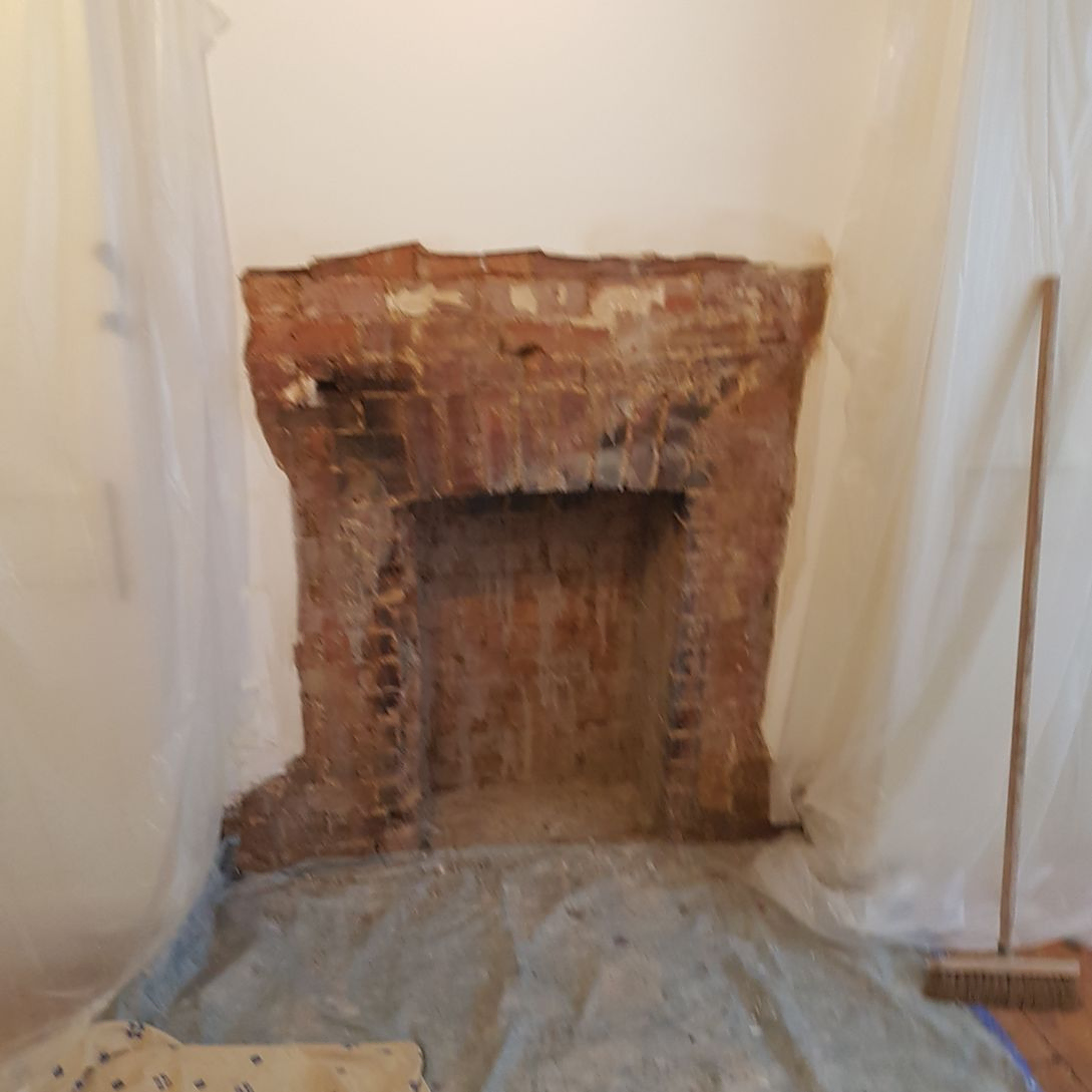 fireplace removed & boxed in & plastered